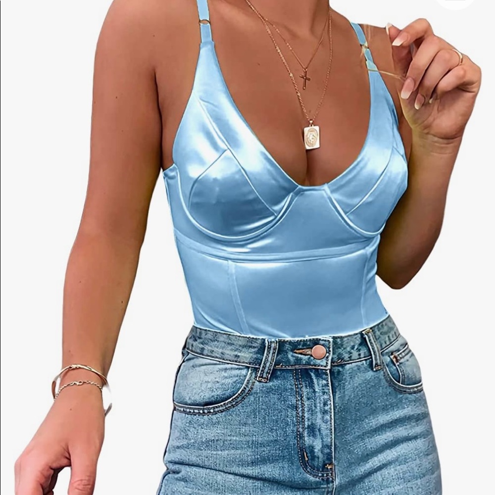 Brand new sky blue body suit! NEVER WORN.